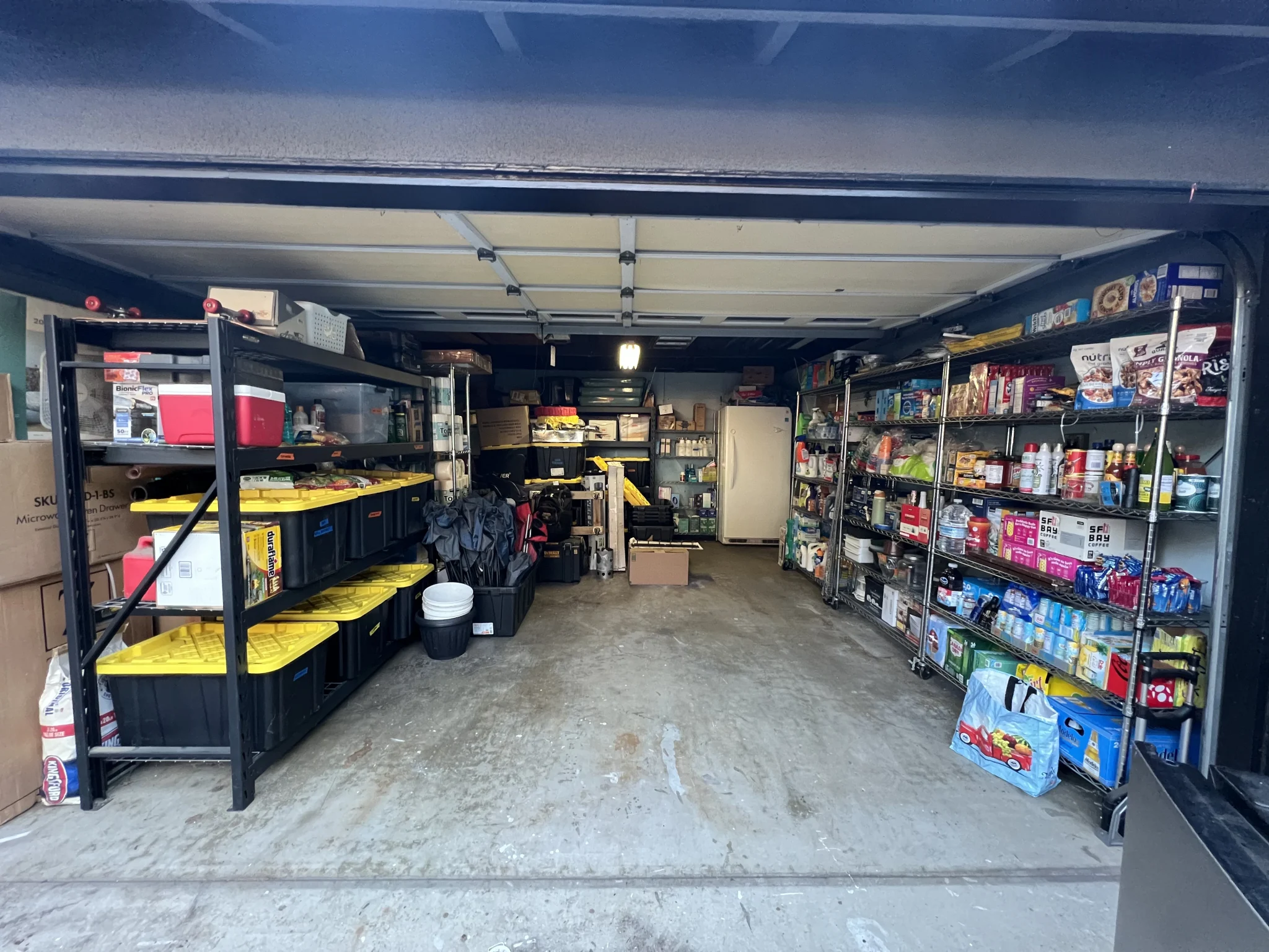 Cluttered garage before APFIA organizing service